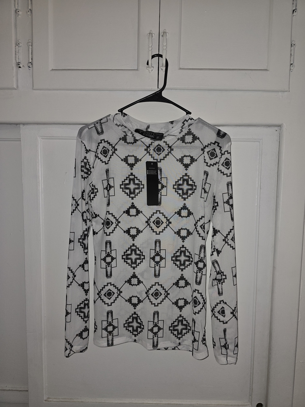 White Long Sleeve Top with Black Geometric Print